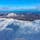 なかなか珍しい冬のオロフレ峠の全景です。左側には苫小牧市の市街地、そこから海沿いに白老町、そして日本一まあるい「倶多楽湖（くったらこ）」へと続いています。オロフレから南（太平洋側）に雪がないのも面白い景色です！#北海道 #登別 #オロフレ峠