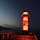せとしるべ（高松港玉藻防波堤灯台）
高松港にある、世界初のガラス灯台だそうです。赤灯台とも言われています。
夕暮れと光が灯った灯台のコントラストが美しいです！
防波堤で釣りをしていたり、灯台を折り返し地点としてジョギングしていたりと、地元の方にも親しまれているようでした。